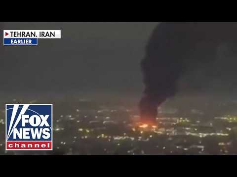 OVERNIGHT: Tehran up in FLAMES as Israel, Iran trade missile strikes
